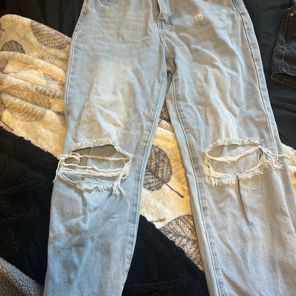 Distressed Light Blue Jeans